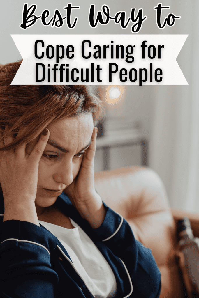 frustrated woman sitting on couch in blue and white top holding her temples for post called best way to cope while caring for difficult people