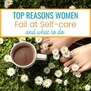 Cup of coffee on grass with white ground cover flowers with yellow centers and clean bare feet