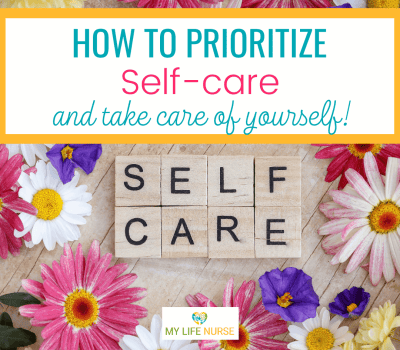 Self-care spelled out in letter game tiles surrounded by purple, white, pink, and yellow flowers all on a tabletop.