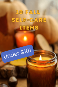lit orange and yellow candles with self-care aesthetic in background for post called 10 fall self-care items under $10