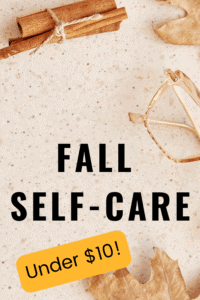 a fall themed background with cinnamon sticks, leaves and eyeglasses.