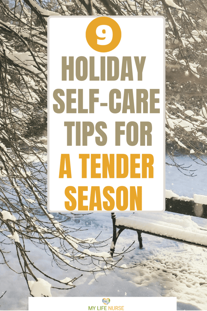 wintery scene with snow on branches of a tree, the ground and an empty park bench