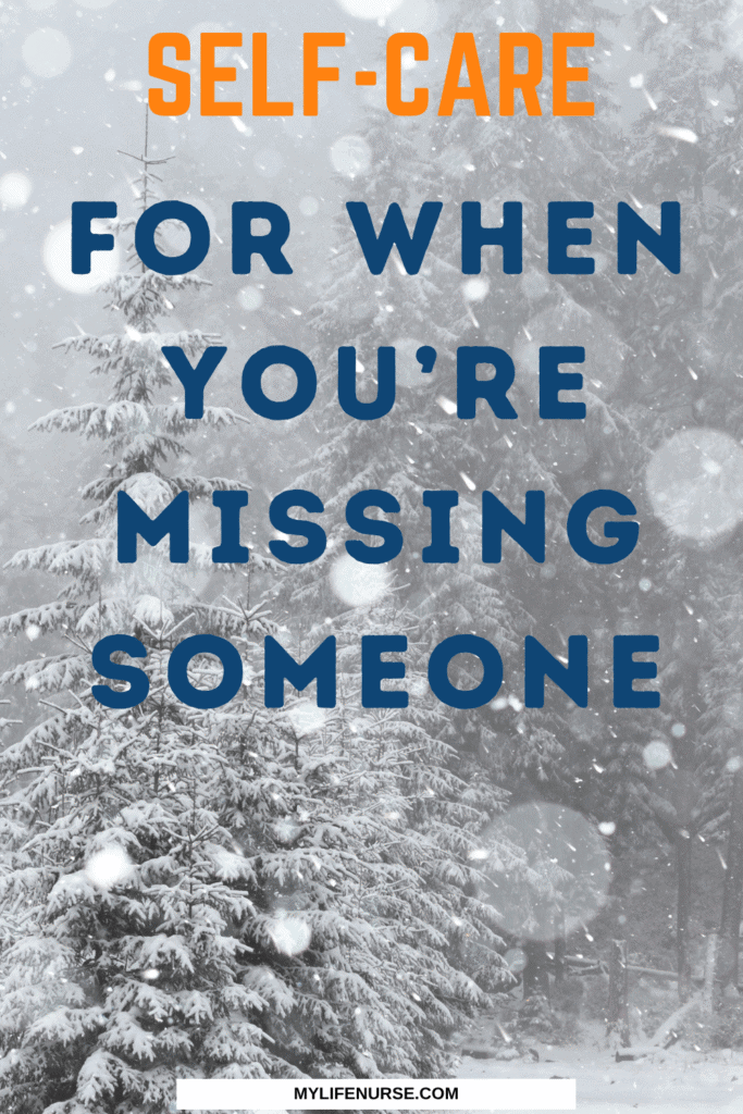 Outdoor wintery scene with snow on an evergreen tree.